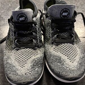 Nike Women’s Black and Gray Flyknit Shoes
